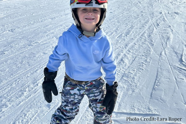 kid snowboarding in red river